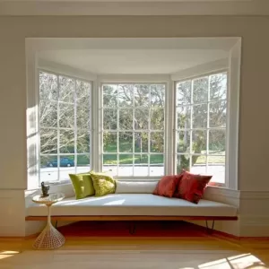Bay and bow window installation showcasing large panoramic glass for enhanced natural light